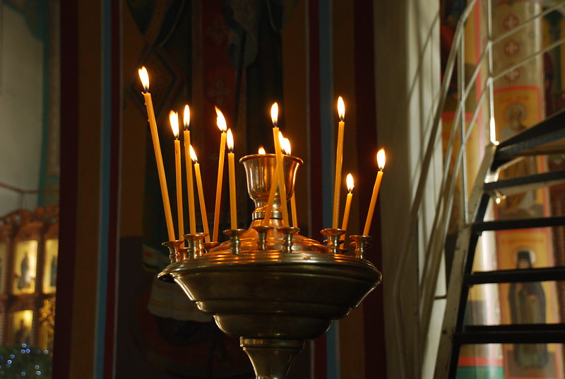 burning candles in church