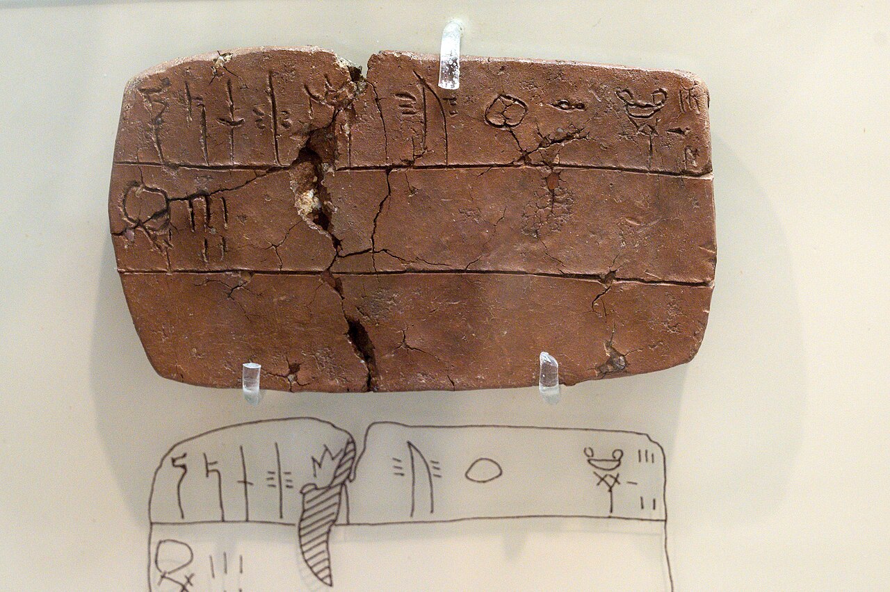 Linear B tablet with an ancient Greek food inscription at the Archaeological Museum of Mycenae