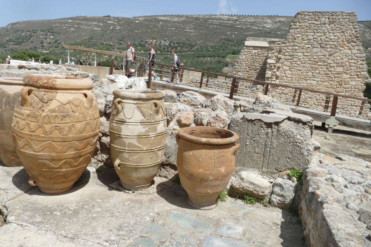 Large Minoan storage jars (pithoi) at the Knossos archaeological site in Crete, Greece.