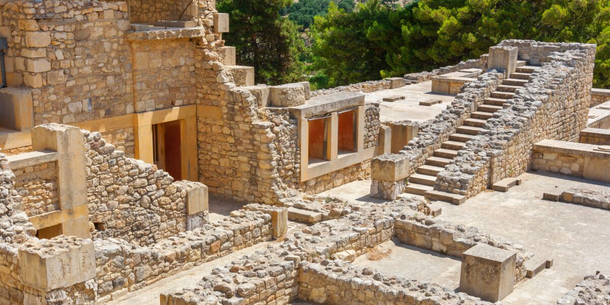 Ruins and stairways of the Minoan Palace of Knossos in Crete, Greece, a key site in ancient Crete history.