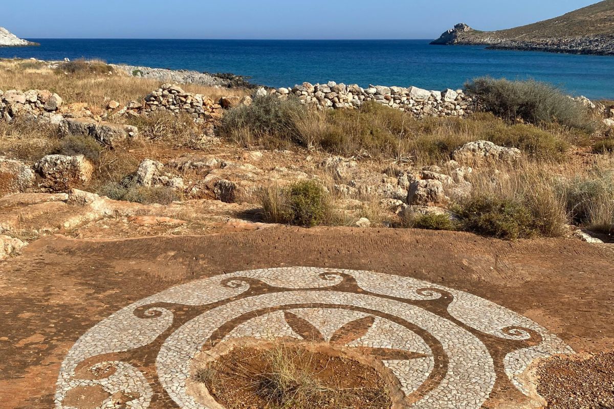 Ancient mosaic remains near the sea in Pylos, Peloponnese, highlighting Greek history and archaeology.