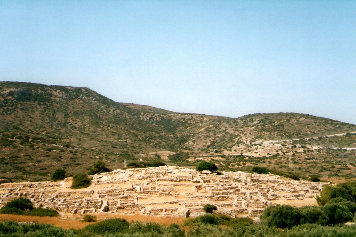 Ancient ruins of Gournia archaeological town in Crete, Greece, showcasing Minoan remains surrounded by hills.