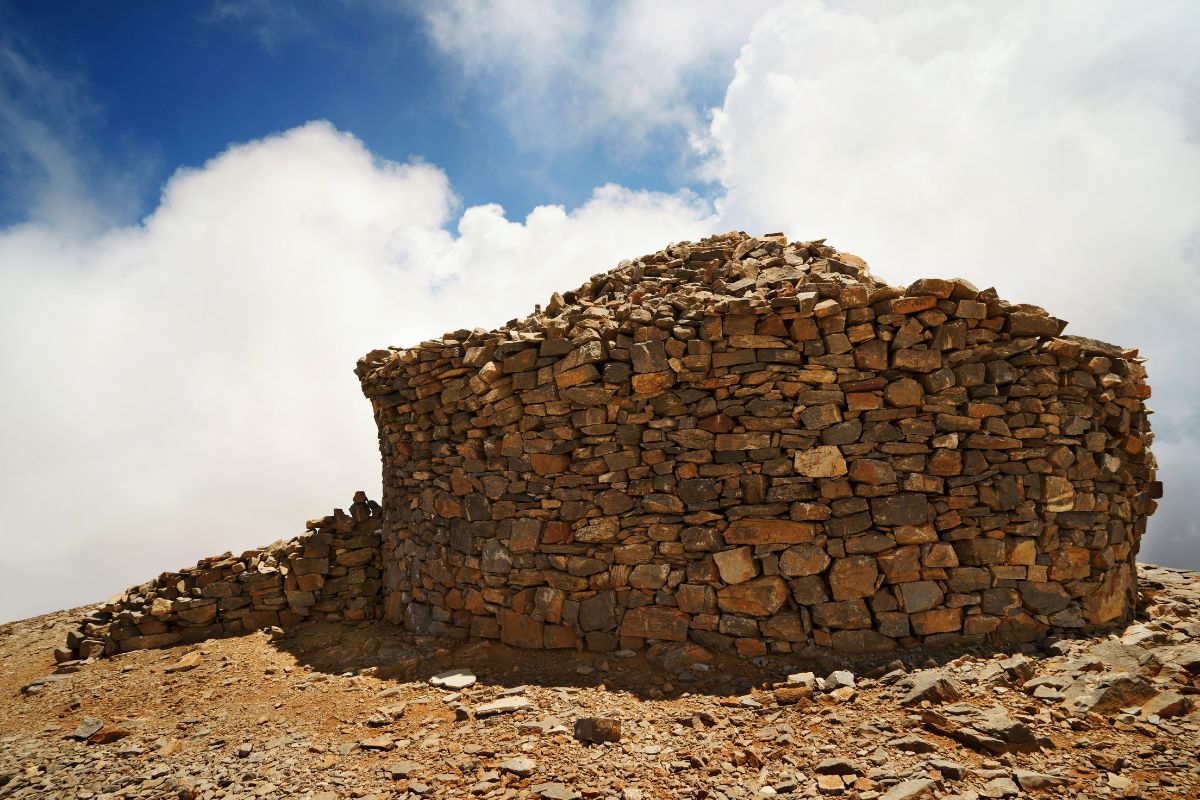 Traditional stone mitato shepherd hut on Psiloritis Crete (Mount Ida), a landmark on the Nida Plateau hiking area.