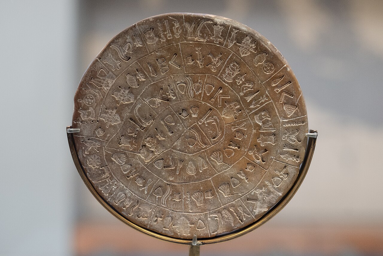Phaistos Disc Side B with stamped symbols arranged in a spiral