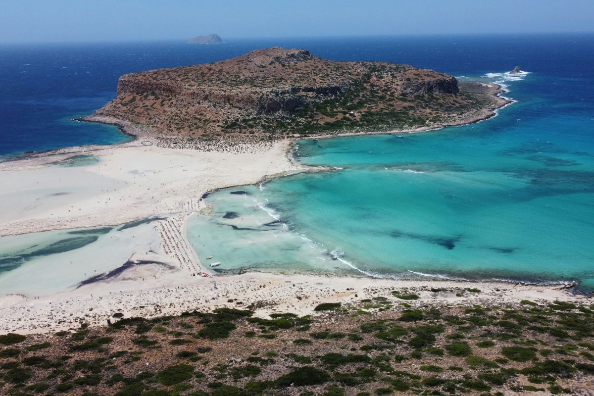 Balos Lagoon in Crete with turquoise waters and white sand in early summer.