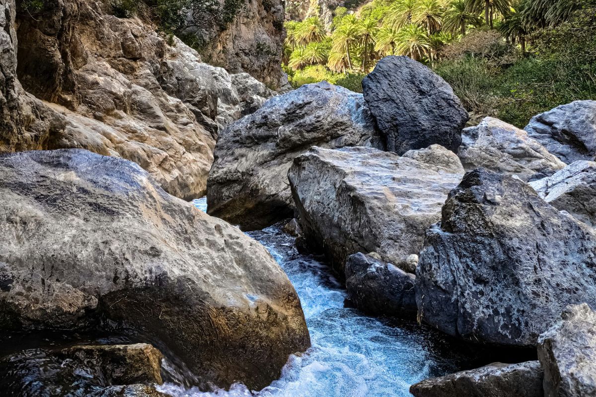 The rugged limestone cliffs of Kourtaliotiko Gorge leading toward south Crete beaches.