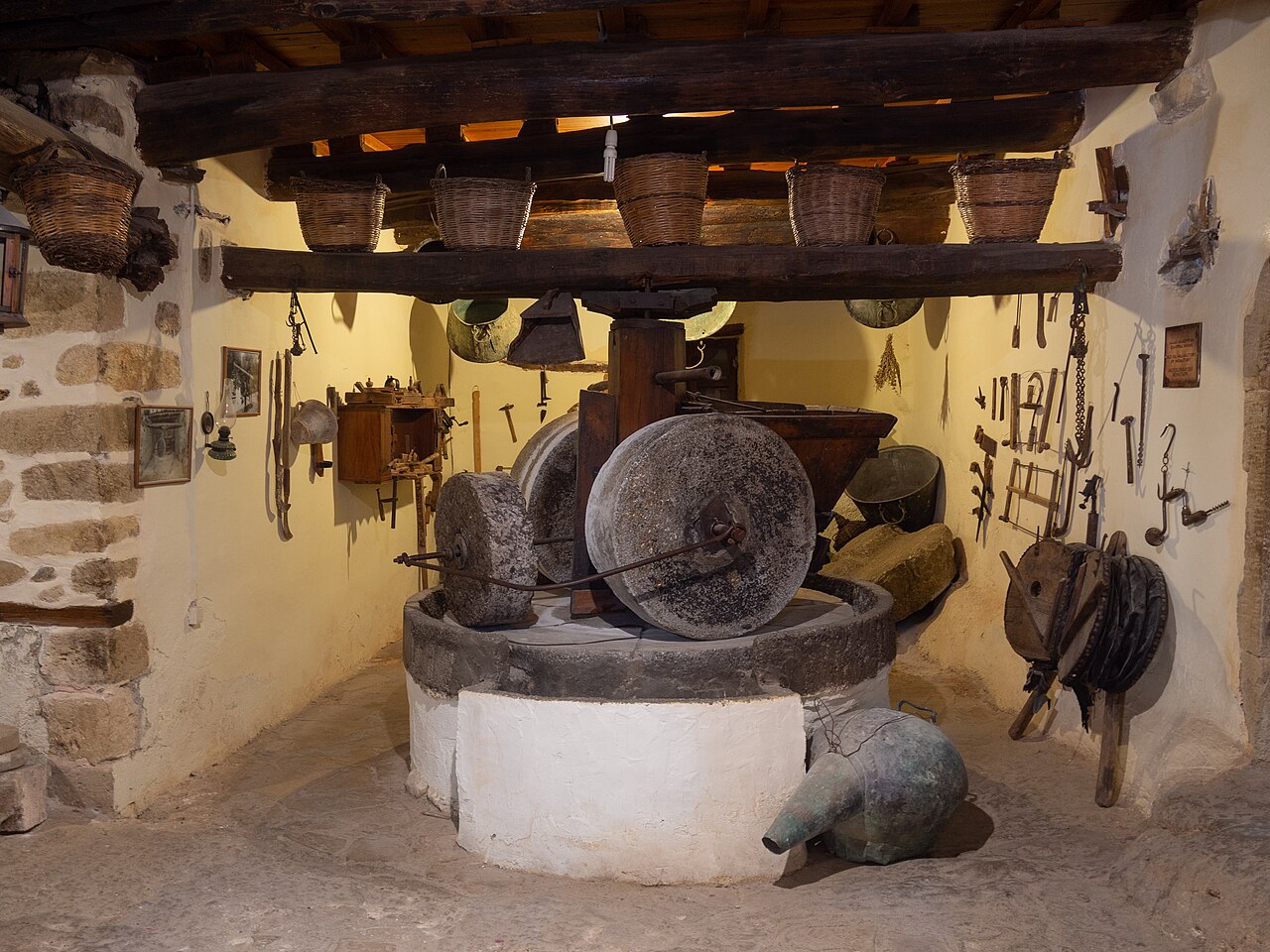 Traditional olive oil mill with stone millstones at Odigitria Monastery in Crete