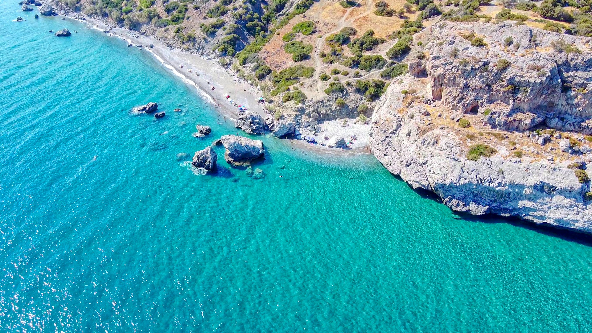 the beach is so special because of the beautiful rocks on the beach itself and in the sea. If you swim around the rock to the east you will end up at another small beach. The name Listis comes from a rocky area on the east side where there are several caves: according to the local residents a bandit (Listis) lived in one of the caves