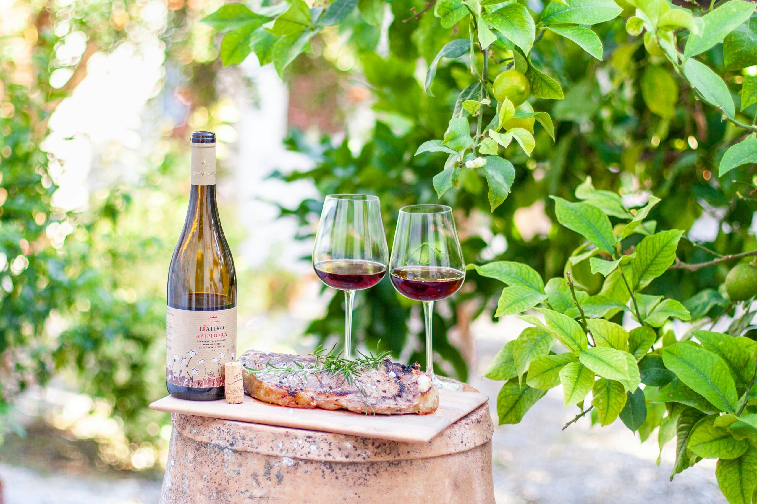 Red natural wine from the island of Crete by Douloufakis winery with a steak.