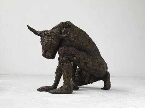 Minotaur of Crete in Greek mythology, depicted as a half-man, half-bull in a bronze sculpture by Stuart Wolfe